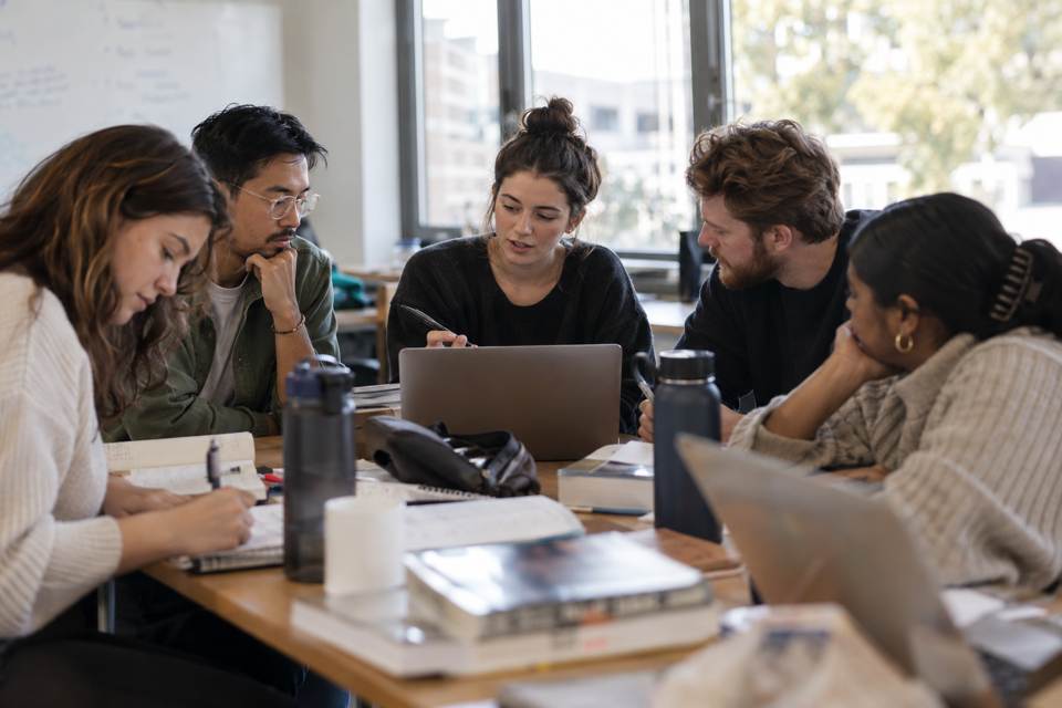 Adults collaborating during a study session